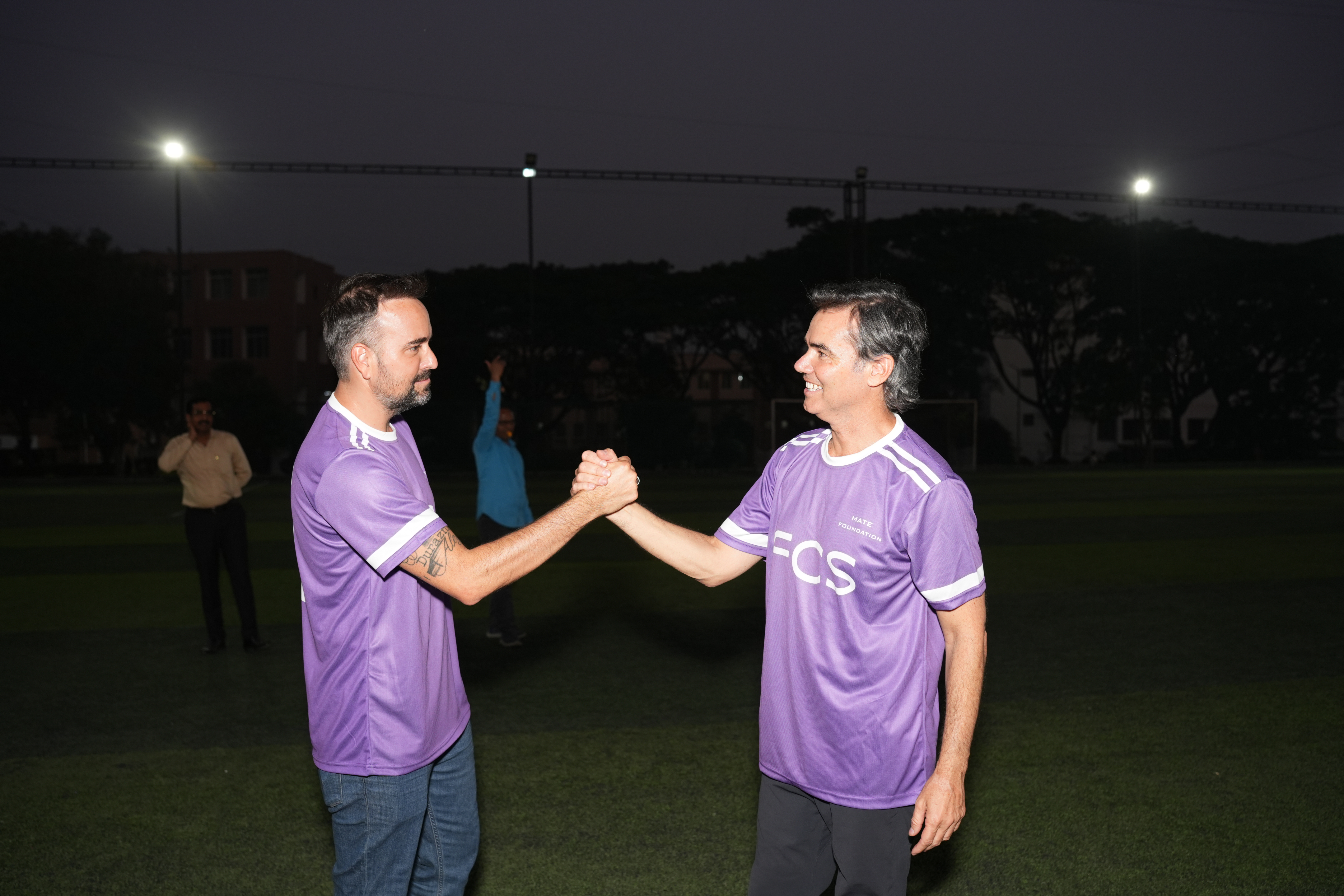 MATE founders and a partner on the pitch